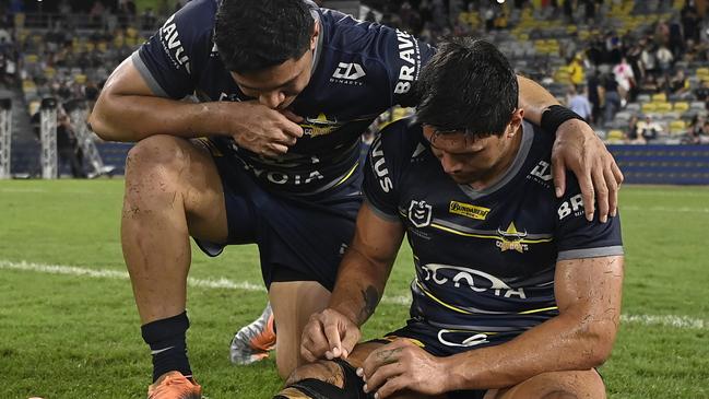 Cowboys teammates Jason Taumalolo and Jordan McLean look dejected after losing the NRL Preliminary Final match between North Queensland and Parramatta. Picture: Getty Images