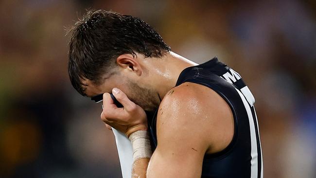 MELBOURNE, AUSTRALIA - MARCH 13: Brodie Kemp of the Blues looks dejected after a loss during the 2025 AFL Round 01 match between the Richmond Tigers and the Carlton Blues at the Melbourne Cricket Ground on March 13, 2025 in Melbourne, Australia. (Photo by Michael Willson/AFL Photos via Getty Images)