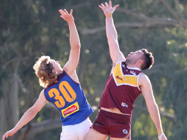Michael Edwards and Tom Blake in the ruck. Picture: George Salpigtidis