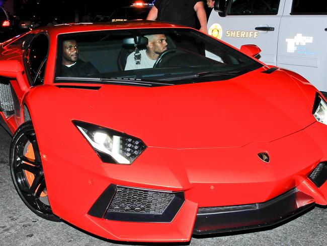 Chris Brown leaving 1OAK night club in Los Angeles early on Sunday morning.