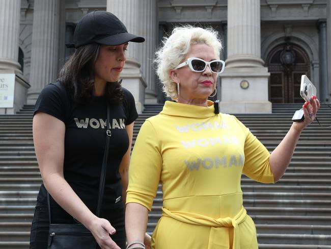 UK far-right activist Kellie-Jay Keen (AKA, Posie Parker) with Mrs Deemingon the steps of parliament. Picture: David Crosling