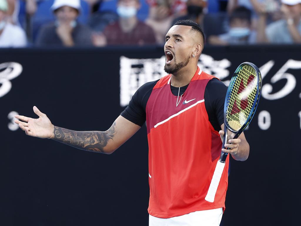 MELBOURNE, AUSTRALIA - JANUARY 21: Nick Kyrgios of Australia reacts in his second round doubles match against Nikola Mektic of Croatia and Mate Pavic of Croatia during day five of the 2022 Australian Open at Melbourne Park on January 21, 2022 in Melbourne, Australia. (Photo by Darrian Traynor/Getty Images)