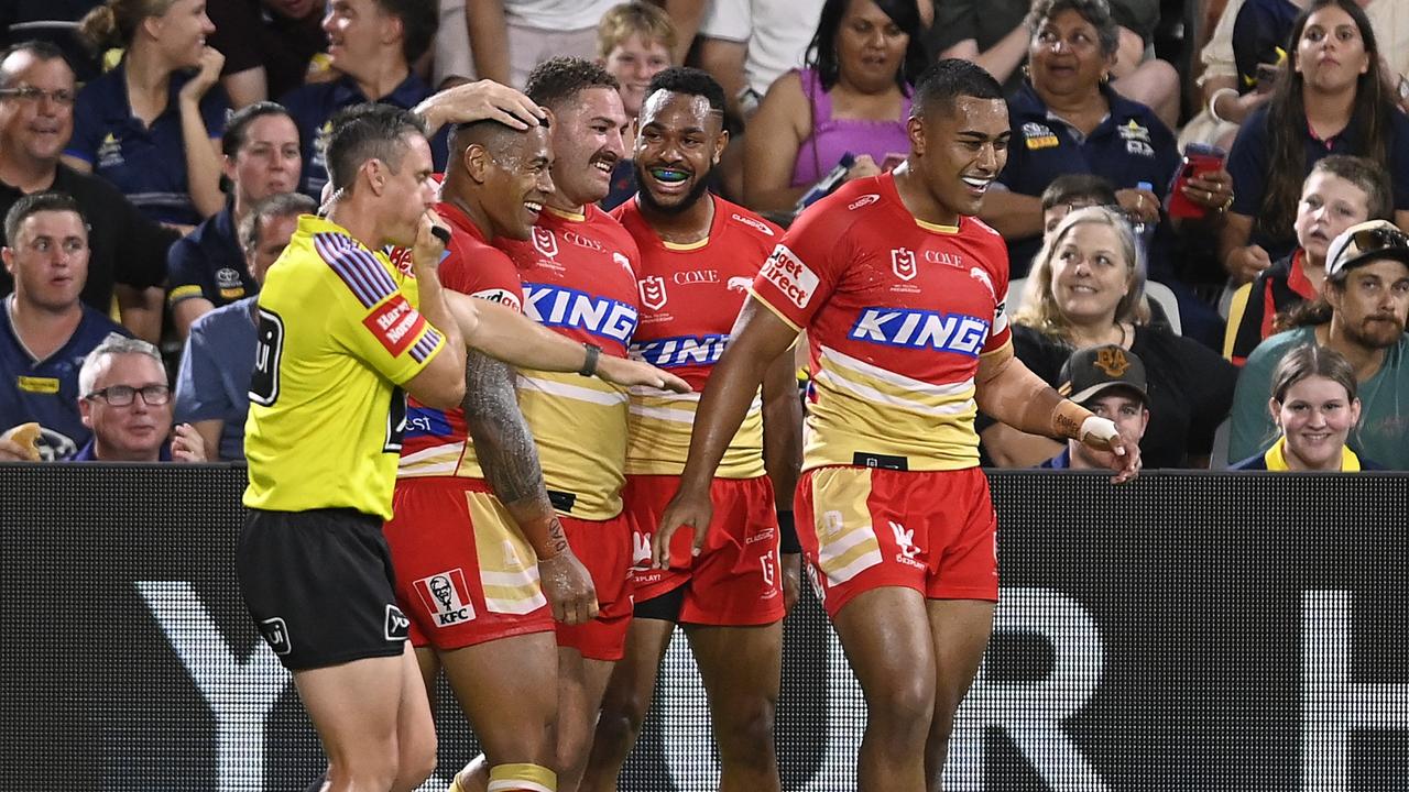 Jamayne Isaako celebrates a try with his Dolphins teammates. Picture: Getty Images