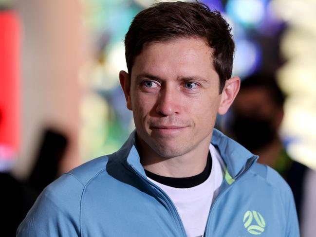 DAILY TELEGRAPH, JUNE 15, 2022: Socceroos Craig Goodwin pictured speaking to media at Sydney Airport. The Socceroos win successfully qualified them for the FIFA World Cup .Picture: Damian Shaw