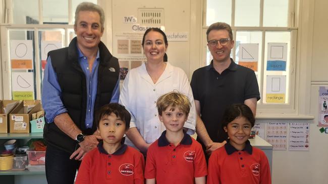 Dee Why Public School principal Mark Chaffer (left) with Department of Education staffers Samara Lake and Nick Leverett, who were part of the "School Experience Program" for Education Department corporate staff, with students Keito Koiwai, Nixon Bollen and Flora Dos Santos. Picture: NSW Department of Education