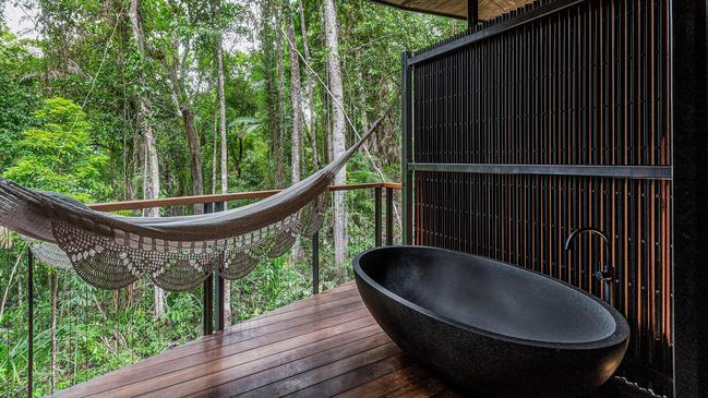 Al fresco stone tubs are a next-to-nature feature. Picture: Toby Stanley