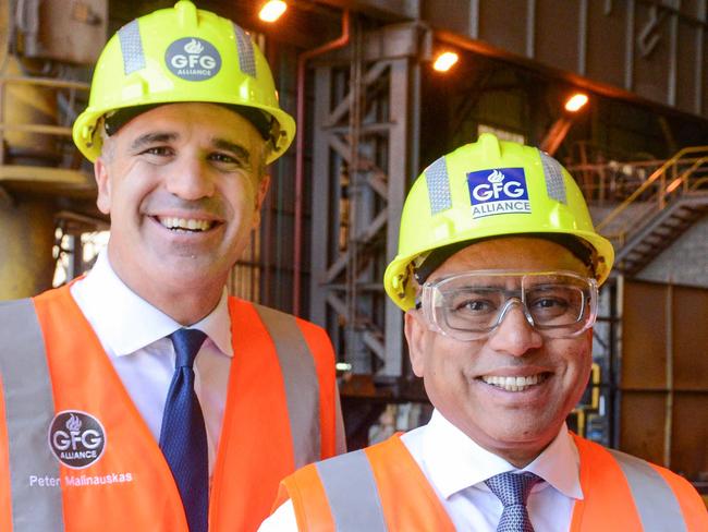 Premier Peter Malinauskas and Federal Minister Ed Husic talk to steel worker Matt Rogers after announcing the Whyalla steel plant will be run on hydrogen fuel, making it the first green steel plant in the world. April 4, 2023. Picture: GFG ALLIANCE/Brenton Edwards