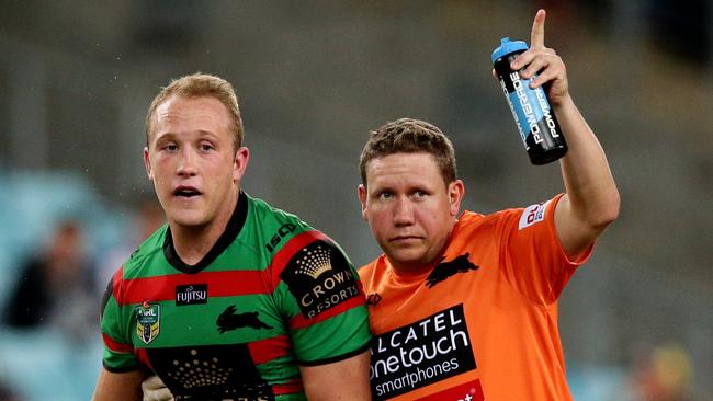 South Sydney’s Jason Clarke goes off with concussion. Picture Gregg Porteous