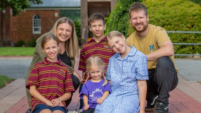 Nicole Fleming, Eamon, 11, Shannon Fleming, right, Ciara, 10, Eloise, 4 and Amelia, 13, celebrate their little girl starting school at the Lobethal Lutheran school. Pictured: Ben Clark.