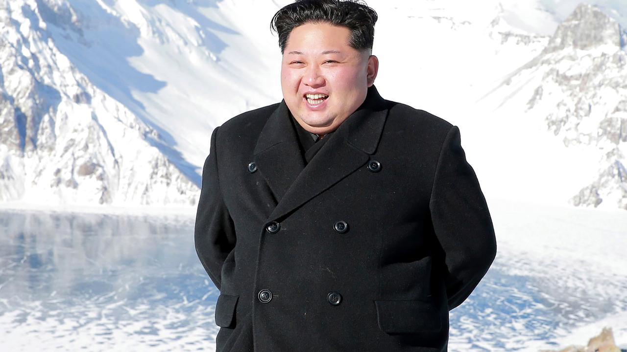 Did you ever see him smile before? Picture: KCNA vis KNS/AFP