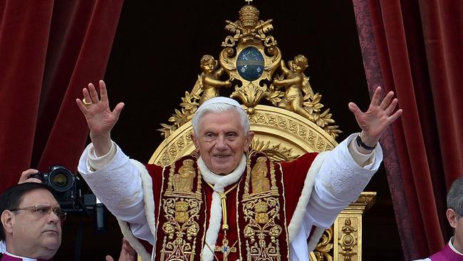 Pope Benedict XVI delivers his Christmas Urbi et Orbi blessing from the balcony of St Peter’s Basilica in 2012. Picture: Vincenzo Pinto/AFP