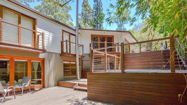 The property has a three-level entertaining deck.