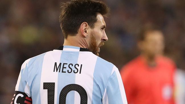 Lionel Messi of Argentina looks on.