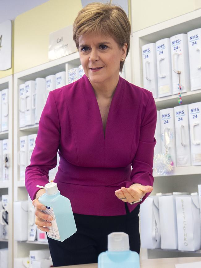 <s1>PROTECTION: Scotland's First Minister Nicola Sturgeon washes up before meeting staff in Glasgow supporting a public information response to COVID-19.</s1> <source> Picture: AFP</source>