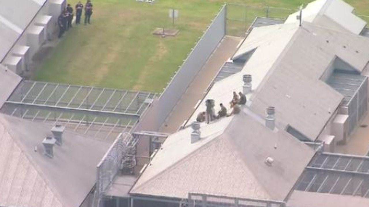 Prisoners on the roof of a building at Borallon Correctional Centre west of Brisbane. Picture: 9 News Queensland/Twitter.