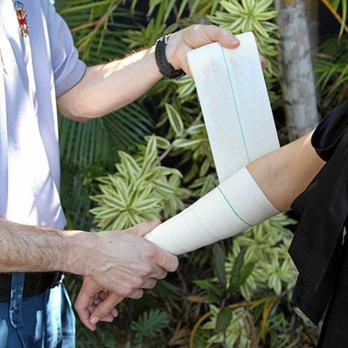 Snake bite: QAS advise to start wrapping a bandage over the bite then work your way up the limb.