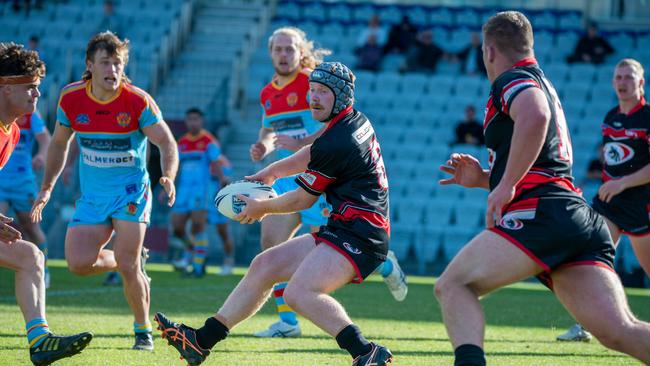 Collegians’ Max Devlin looking to pass. Picture: Thomas Lisson