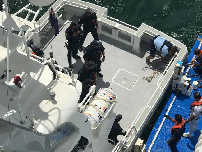 Officers board the P&amp;O Pacific Explorer. Picture: Leanne Lane