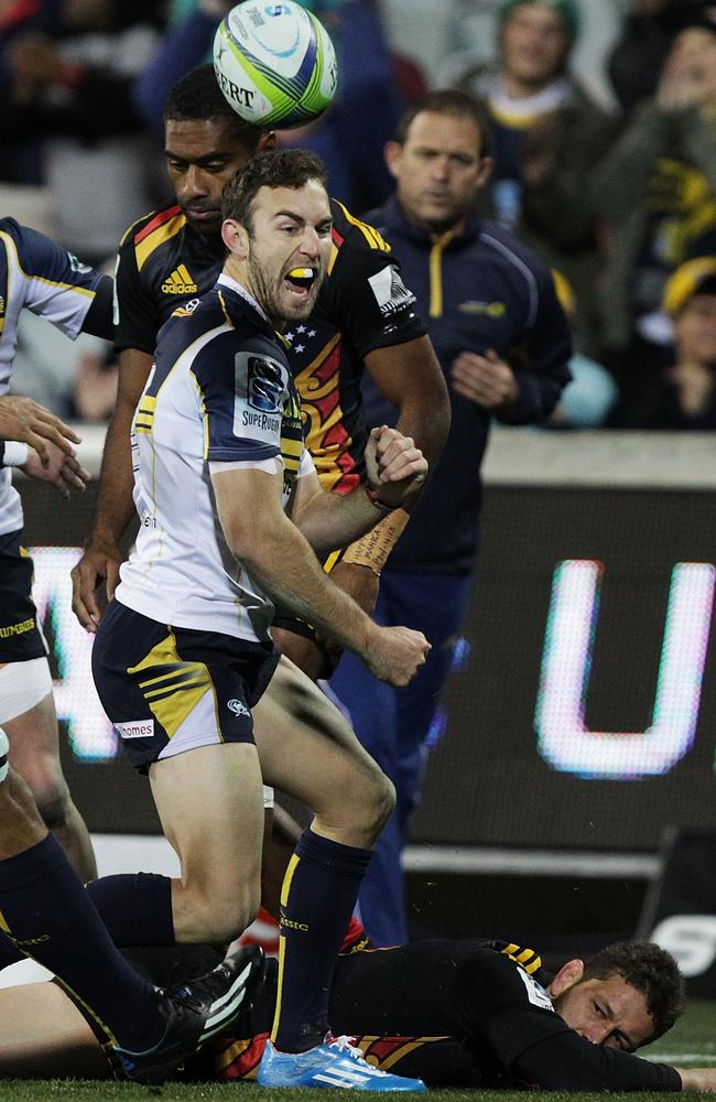 Nic White celebrates his try for the Brumbies.