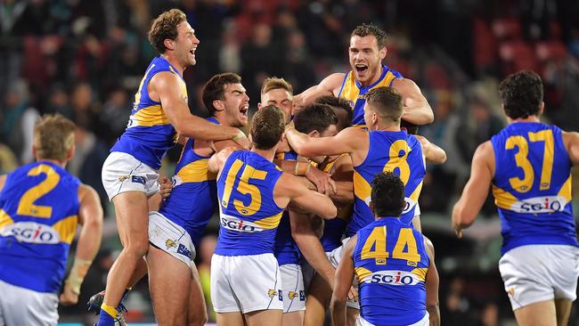 West Coast players celebrate the after-the-siren win over Port Adelaide. Picture: Getty