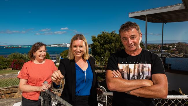 Conlie and Cheryl Menzel at their Port Lincoln property with Kemp Real Estate agent Jade Fraser (centre). Picture: Robert Lang