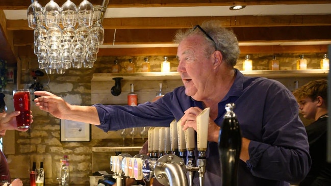 Jeremy Clarkson pouring drinks at his newly opened pub. Picture: The Farmers Dog