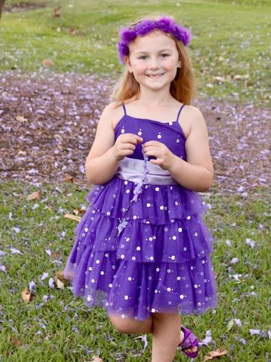 Zarly Morgan, 6, wins $75 for 2nd prize in the Grafton Jacaranda Festival's official 2020 Midcoast Family Day Care Best Dressed Girl competition.