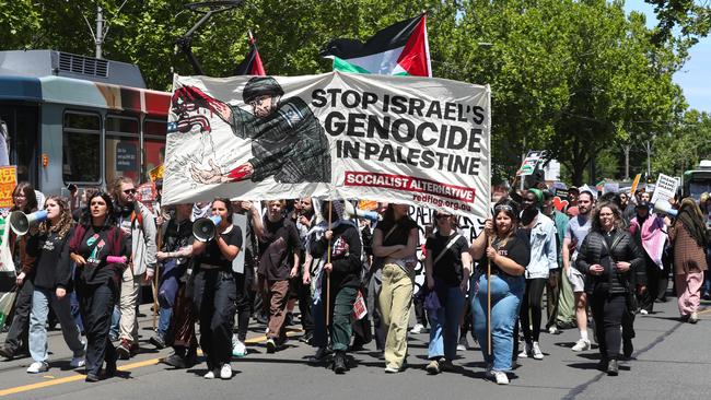 A student protest calling for Israel to end the war in Palestine held at the American Consulate in Melbourne marches down St Kilda Road. Picture: NCA NewsWire/David Crosling