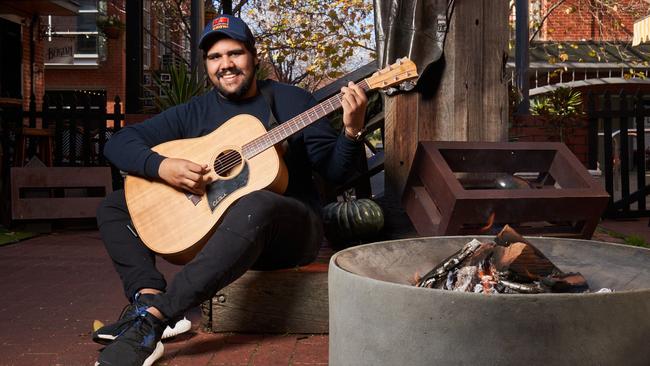 Singer-songwriter Nathan May is one of many playing pop-up gigs around the city. Picture: Matt Loxton