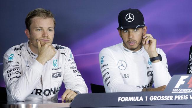 Mercedes drivers Nico Rosberg (L) and Lewis Hamilton (R).