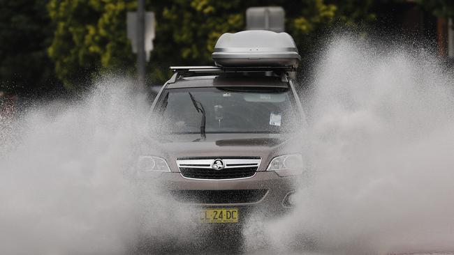 Flash flooding can close roads suddenly. Photos by Chris Pavlich for The Daily Telegraph