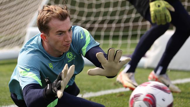 DOHA, QATAR - JANUARY 29: Australian goalkeeper Joe Gauci makes a save during an Australia Socceroos recovery session ahead of the the AFC Asian Cup at Qatar University Field 11 on January 29, 2024 in Doha, Qatar. (Photo by Robert Cianflone/Getty Images)