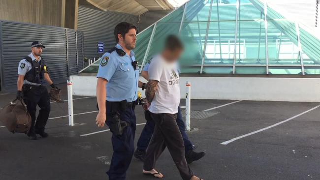 Police arrest Sami Hamalainen at Sydney Airport in relation to the 2013 murder of Johnny Salafia.