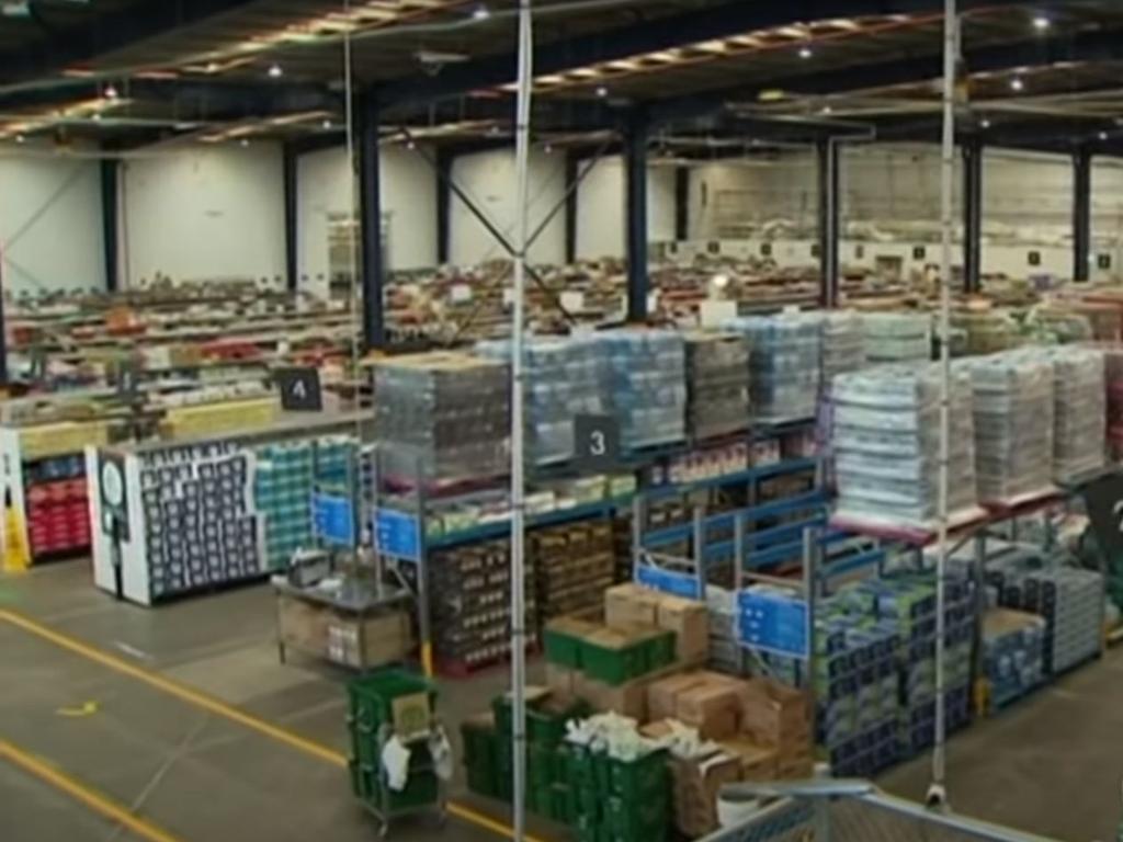 The custom-built distribution centre in west Sydney is Woolworths' largest 'dark store' in the country.