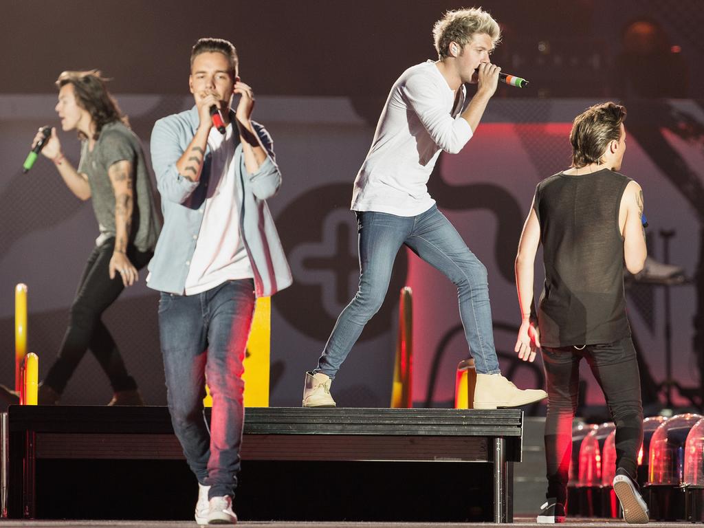 From back left: Harry Styles, Liam Payne, Niall Horan and Louis Tomlinson of One Direction, performing onstage in Seattle in 2015. Picture: Mat Hayward/Getty Images