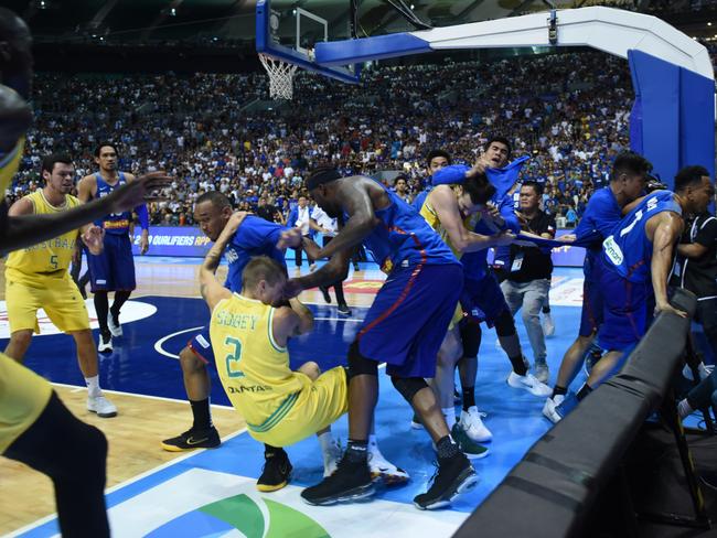 Philippines players, coaches and supporters attack Australian players. Picture: Getty