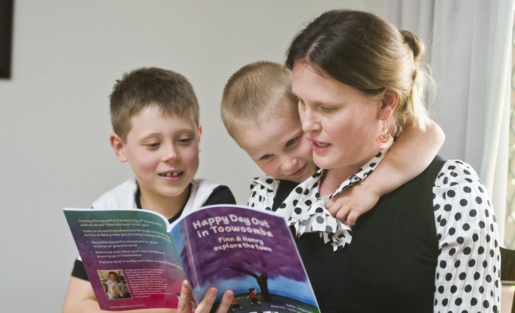 HAPPY READ: ( From left ) Finn, Henry and Megan Carige read the book written by Megan. Thursday, 19th Oct, 2017. Picture: Nev Madsen