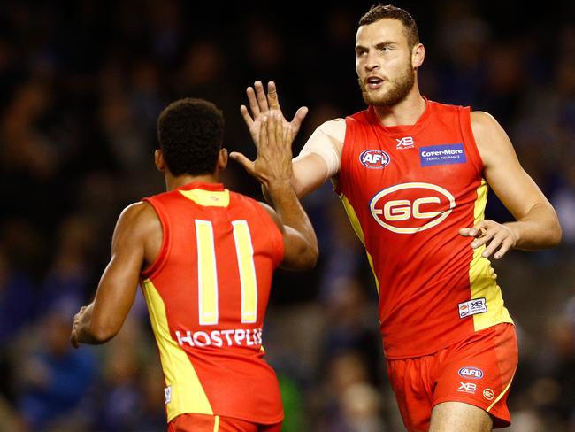 Suns ruckman Jarrod Witts (right) says he has felt the positive effects of working with sports psychologist Cliff Mallett. Picture: Daniel Pockett, Getty Images.