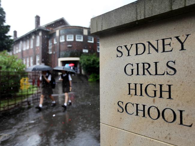 01/02/2016: Students leave Sydney Girls High School after it was evacuated due to a bomb threat. At least eight police operations are underway at Sydney schools. Hollie Adams/The Australian