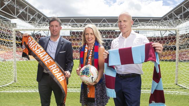 Roar coach Robbie Fowler, QLD Minister Kate Jones, and former West Ham player and sports commentator Robbie Slater will have to wait just a little bit longer to watch matches between Crystal Palace FC, West Ham United FC and the Brisbane Roar at Suncorp Stadium. Picture: Jono Searle/Getty Images