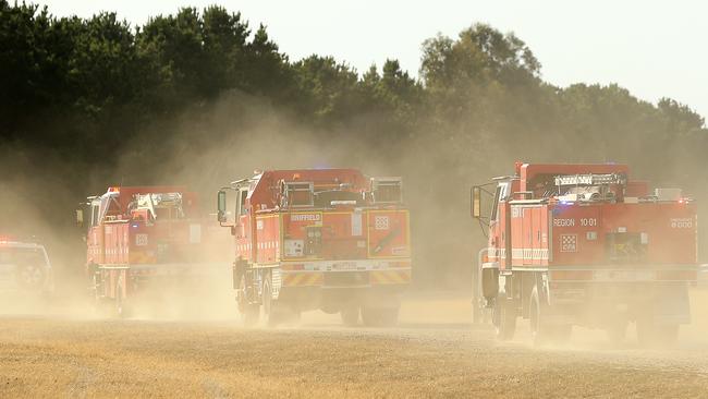 Fire trucks attending to the scene of the Rosedale bushfire. Picture: Mark Stewart