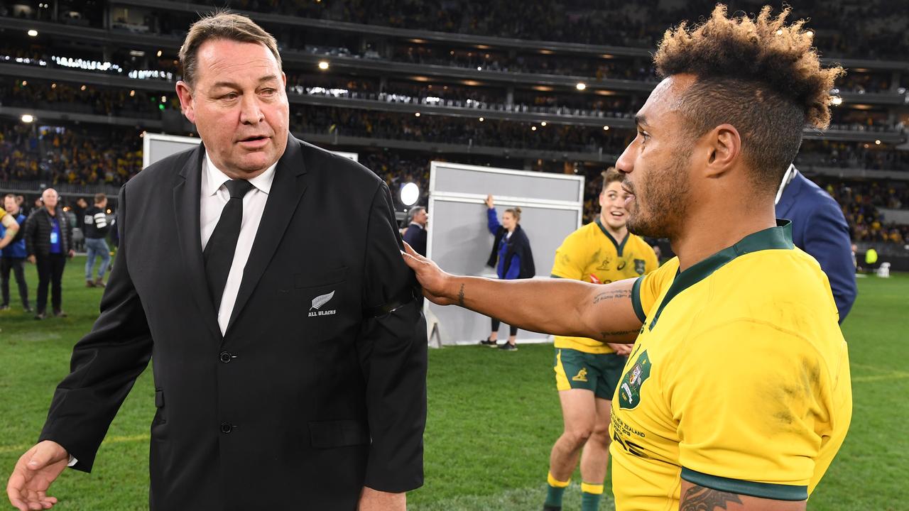 All Blacks coach Steve Hansen with Will Genia of the Wallabies at Optus Stadium.