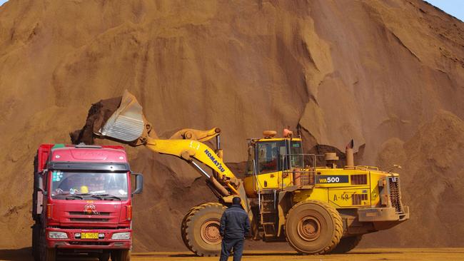 China’s monthly imports of iron ore hit 100 million tonnes in September. (Pic: AFP)