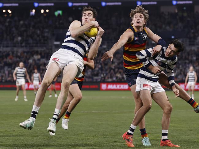 Jeremy Cameron takes a mark after burning off Nick Murray to sprint from centre-half-back to the forward 50. Picture: Darrian Traynor/Getty Images.