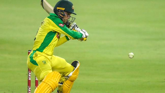 Australia's Alex Carey playing a shot during the first T20 international cricket match between South Africa and Australia at The Wanderers Stadium in Johannesburg on February 21, 2020. (Photo by Christiaan Kotze / AFP)