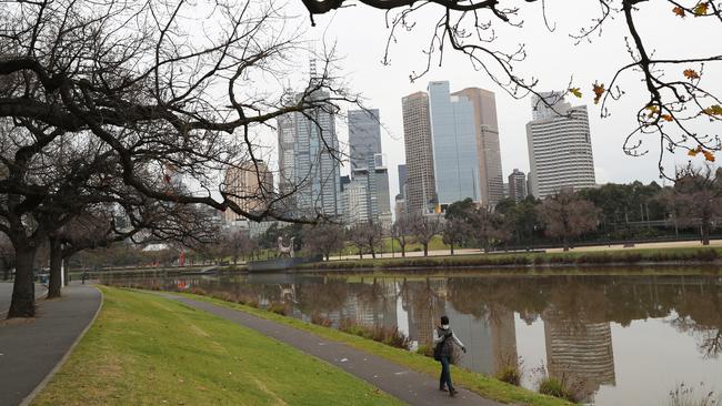 A lone walker along the Yarra River during the stage four lockdown. Picture: NCA NewsWire / David Crosling