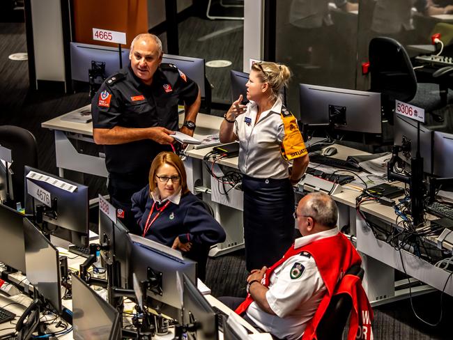 Workers at the State headquarters for NSW RFS. Picture: Monique Harmer