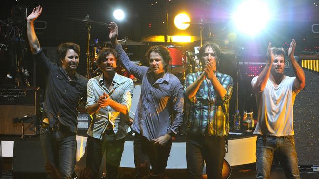 The band bids farewell after its final public performance on November 13, 2010 at the Brisbane Riverstage. Picture: Dave Hunt