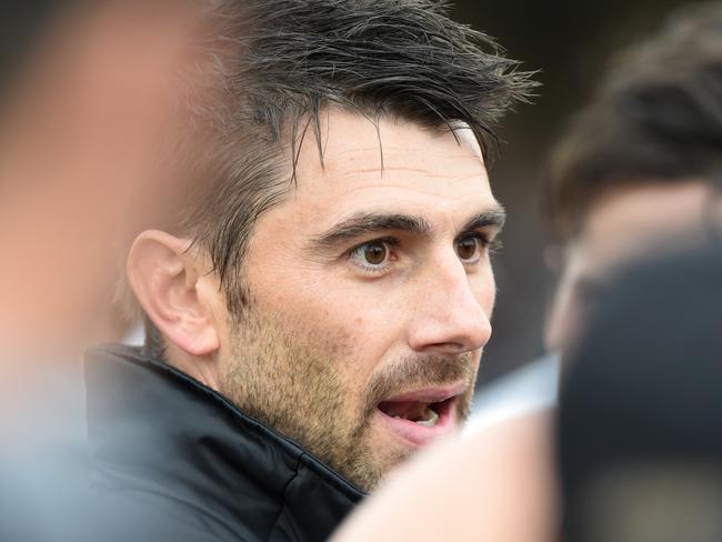 South East FNL: Narre Warren v Doveton.Narre Warren Coach Heath Black talks with his players at quarter time.Picture: Jason  SammonSaturday 15 April 2016