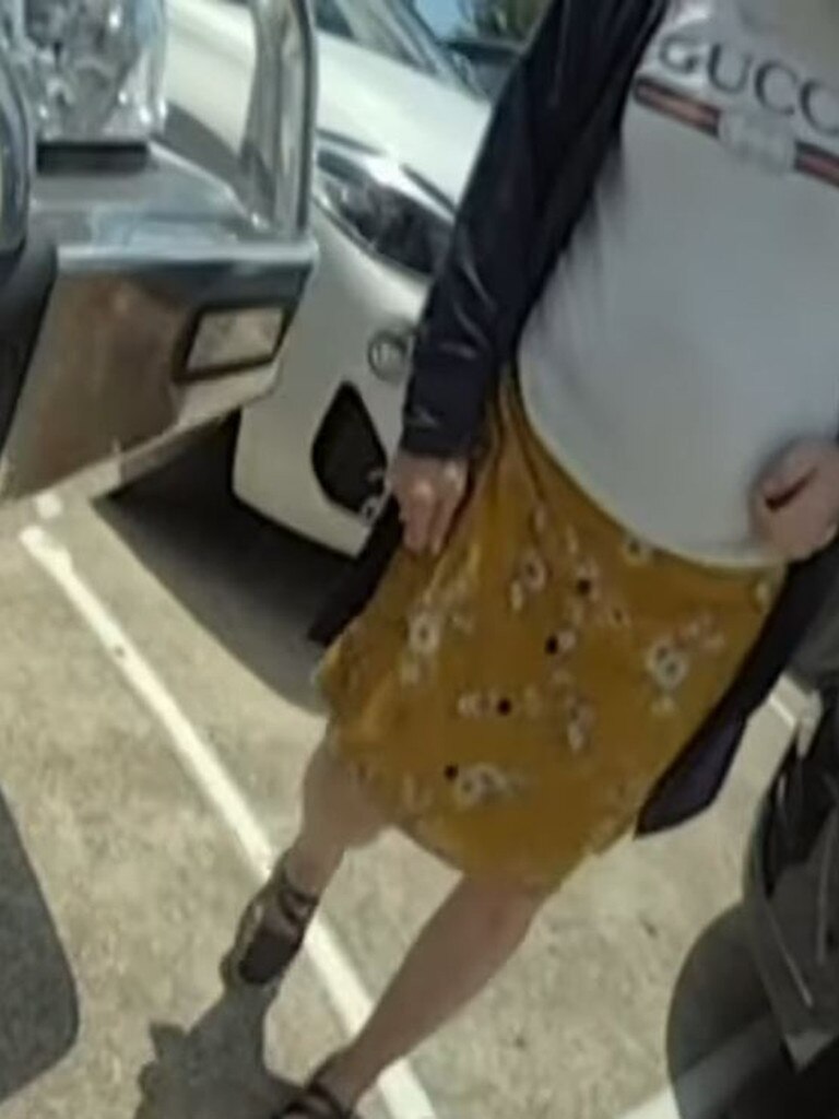 A Gucci wearing woman was also filmed allegedly keying the cars at Brookside Shopping Centre. Credit: 7News